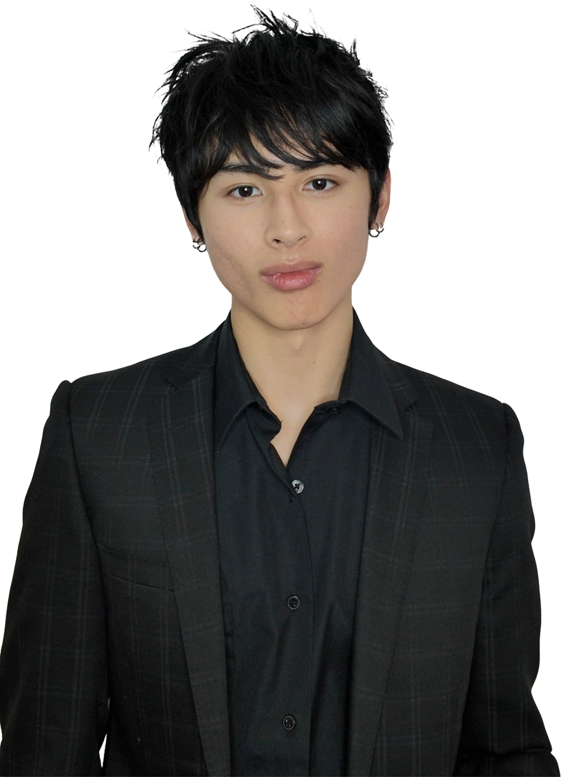 Portrait of Logan Del Rosario in a black blazer